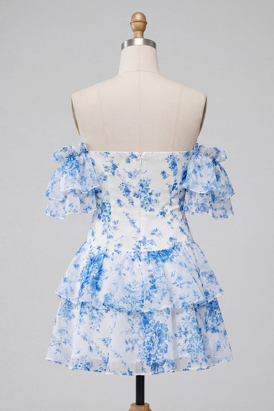 Robe de soirée bustier asymétrique bleue trapèze à volants fleuri