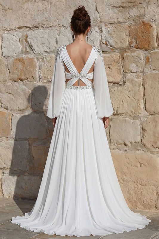 Vestido largo de novia línea A de chifón color marfil con cuentas y abertura