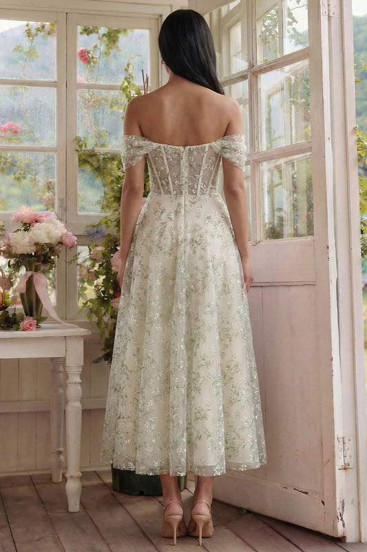 Robe midi en tulle ligne A vert clair avec corset, épaules dénudées et appliques