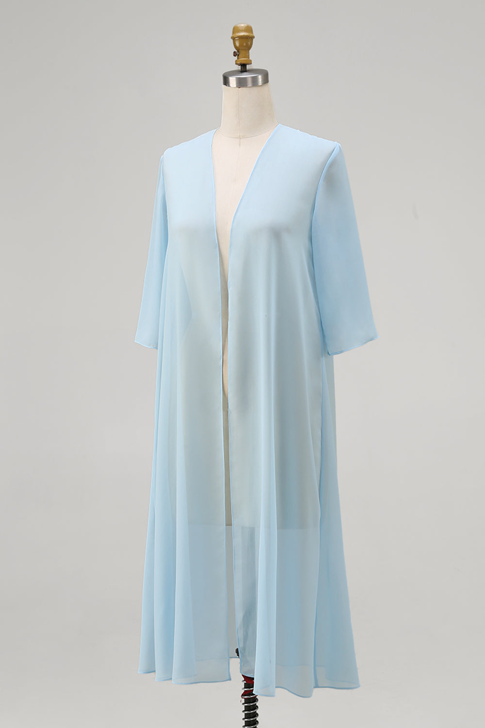 Veste en mousseline bleu ciel à manches mi-longues