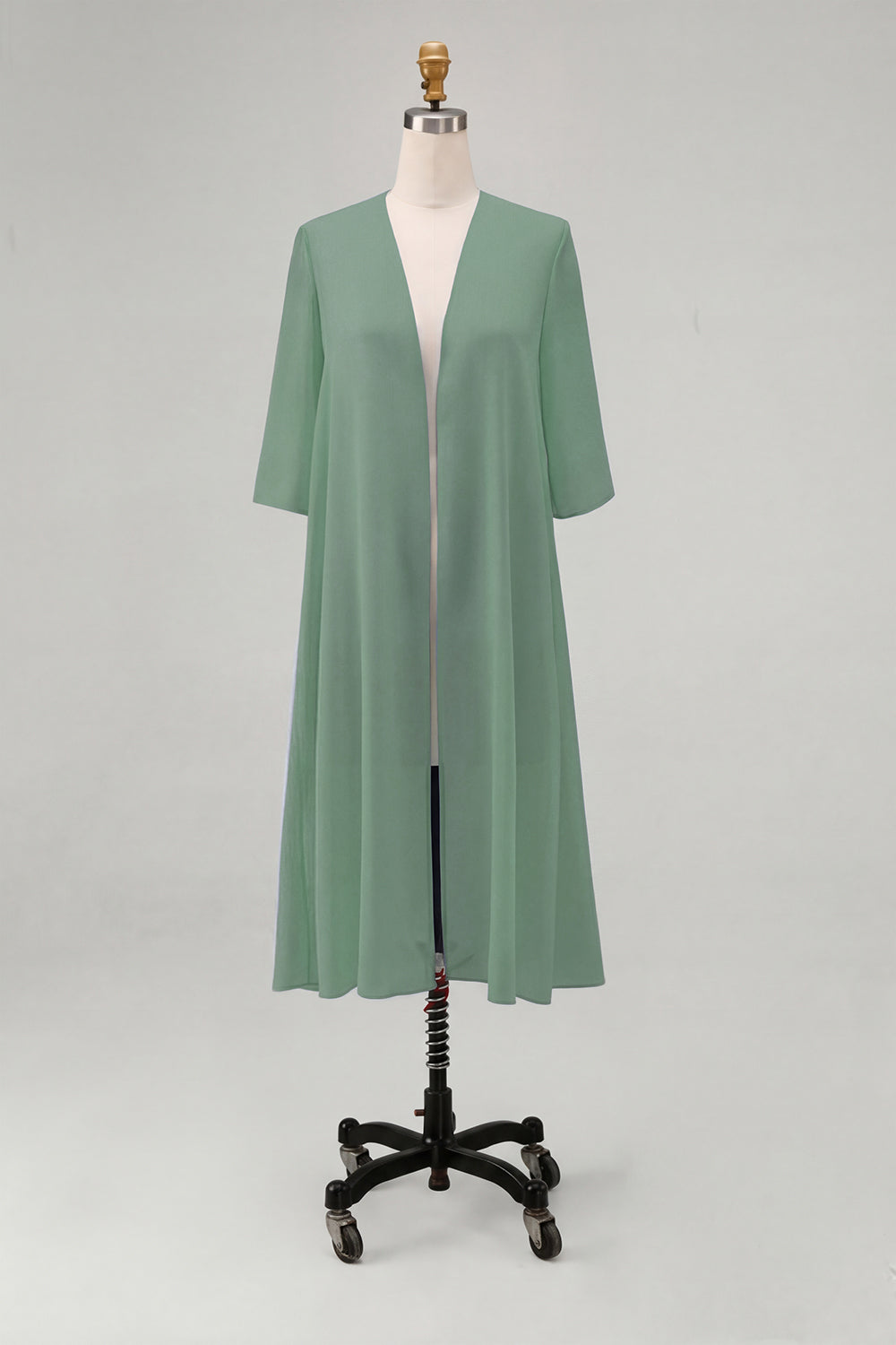Veste en mousseline bleu ciel à manches mi-longues