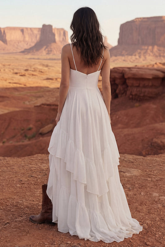 Robe de mariée longue bohème ivoire évasée à volants avec fente