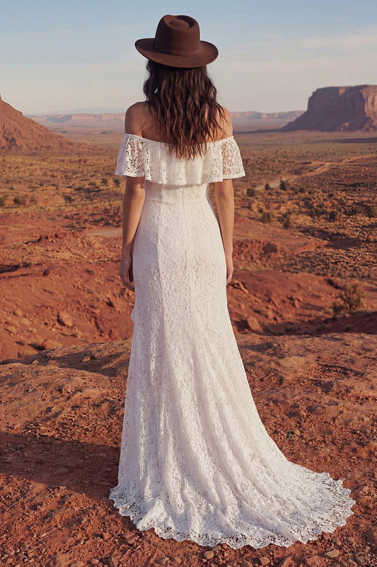 Vestido de novia largo bohemio sirena color marfil floral con volantes