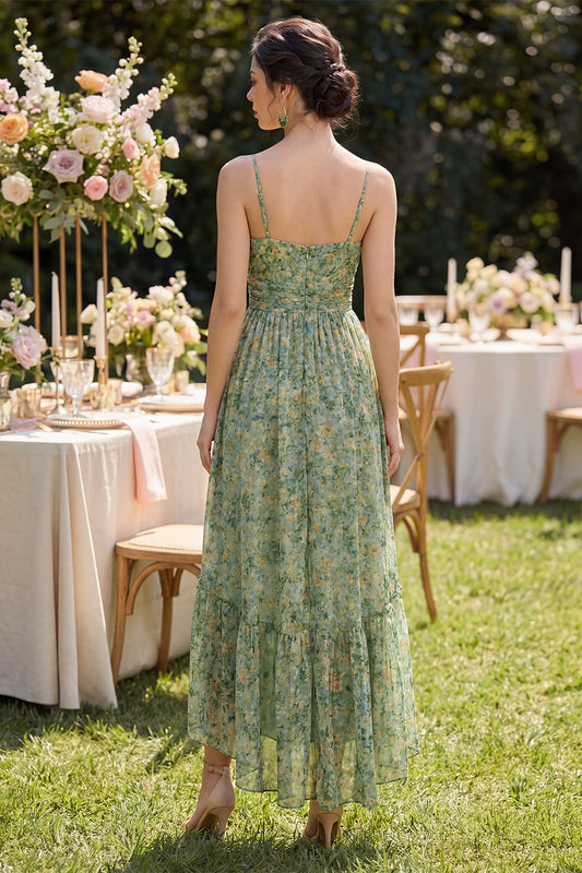 Robe fleurie asymétrique vert poussière à volants, col en V froncé