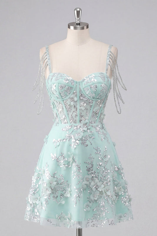 Robe de bal ornée d'appliqués floraux menthe, coupe trapèze avec corset et épaules dénudées