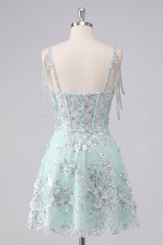 Robe de bal ornée d'appliqués floraux menthe, coupe trapèze avec corset et épaules dénudées