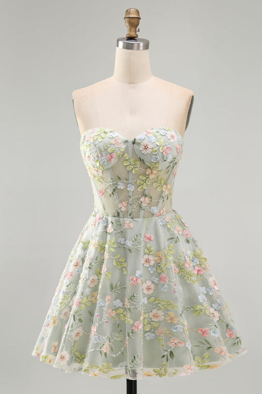 Robe de cocktail évasée vert tendre en tulle avec corset transparent et appliques florales