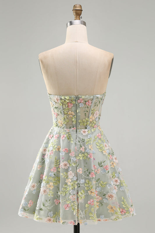 Robe de cocktail évasée vert tendre en tulle avec corset transparent et appliques florales