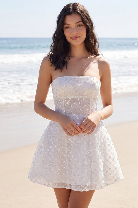 Vestido mini sin tirantes con corsé y pedrería en línea A color marfil