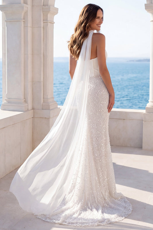 Vestido de novia de sirena con corsé sin tirantes de lentejuelas color marfil con pañuelo