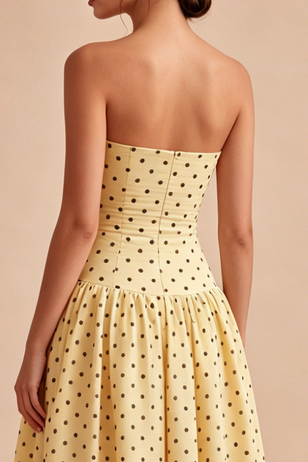 Robe midi bustier évasée noire et jaune à pois