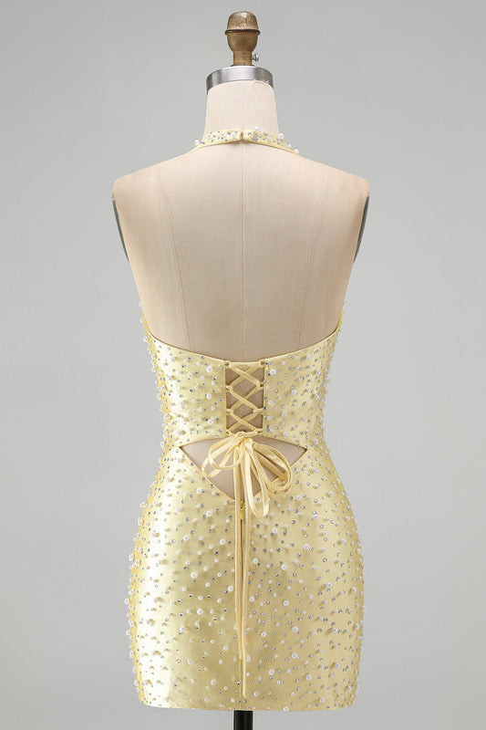 Robe de soirée moulante jaune à licou avec perles découpées et perles