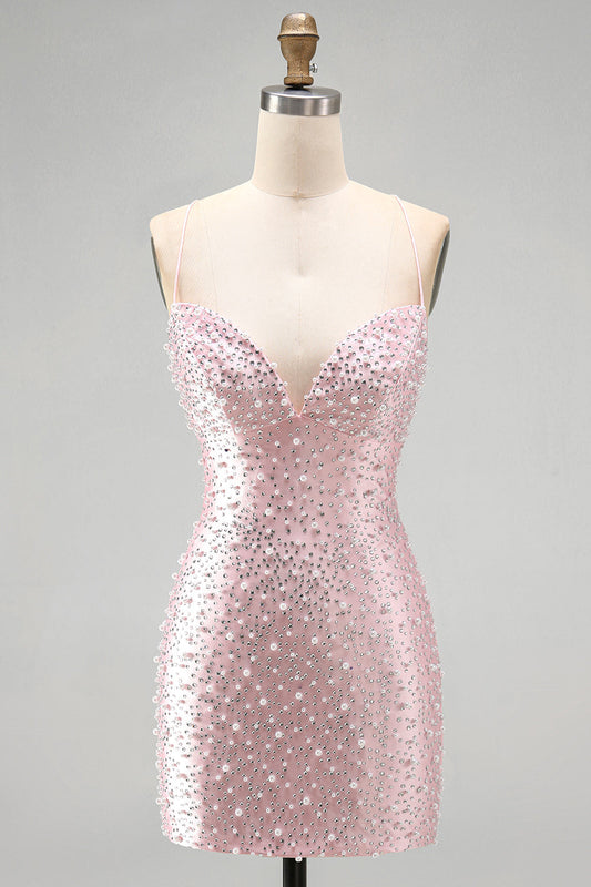 Robe courte de cocktail rose moulante à bretelles spaghetti et perles
