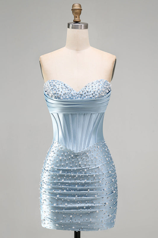 Robe courte de cocktail bustier bleu gris ornée de perles et broderies corsetées ajustée