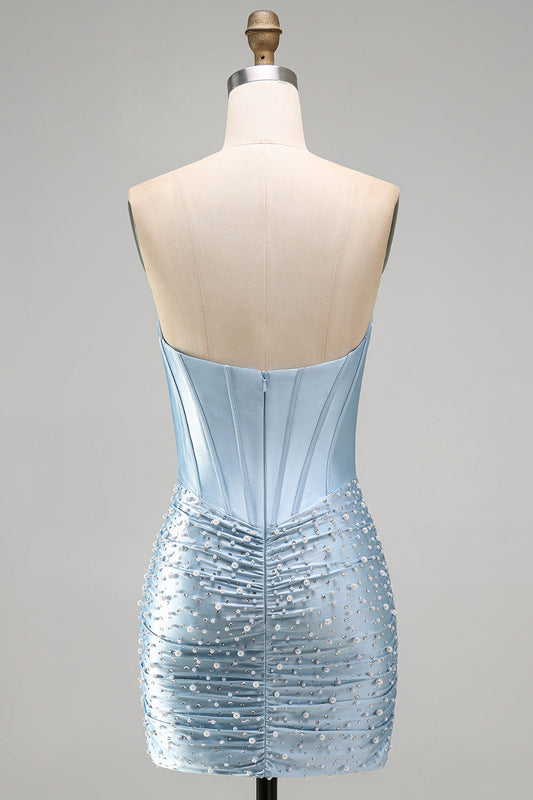 Robe courte de cocktail bustier bleu gris ornée de perles et broderies corsetées ajustée
