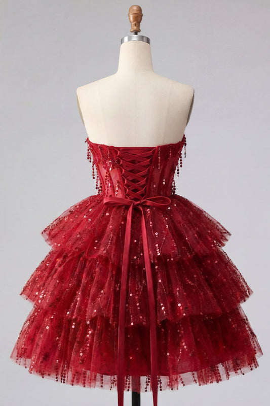 Vestido de regreso a casa con corsé de lentejuelas escalonado con escote corazón en color burdeos A-Line