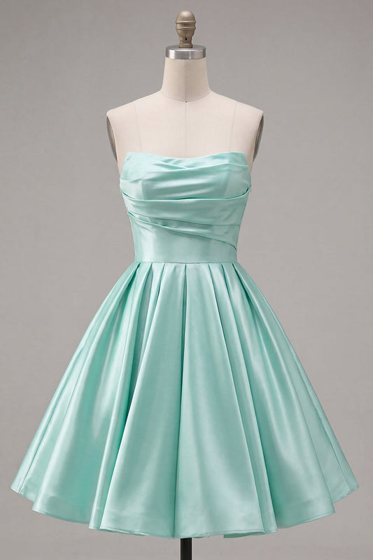 Robe de cocktail bustier froncée en satin trapèze vert menthe