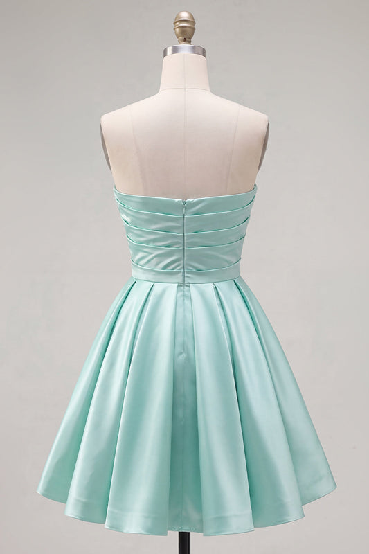 Robe de cocktail bustier froncée en satin trapèze vert menthe