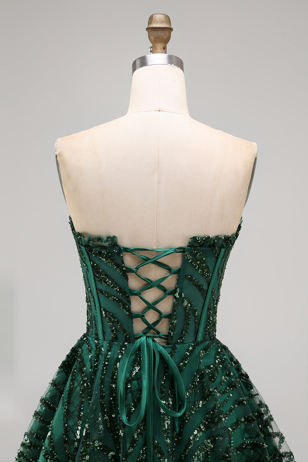 Robe de bal bustier coupe trapèze vert foncé à sequins scintillants