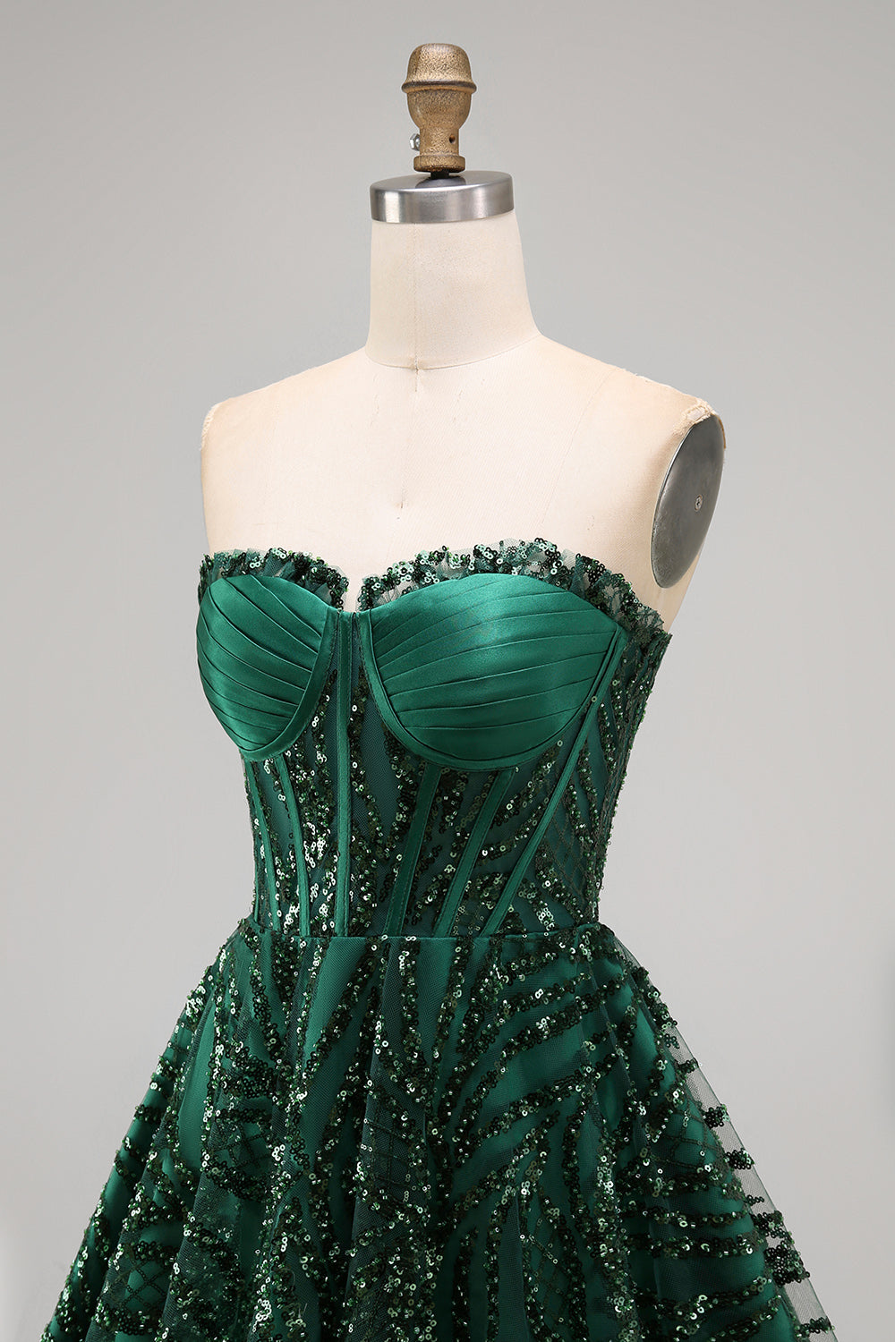 Robe de bal bustier coupe trapèze vert foncé à sequins scintillants
