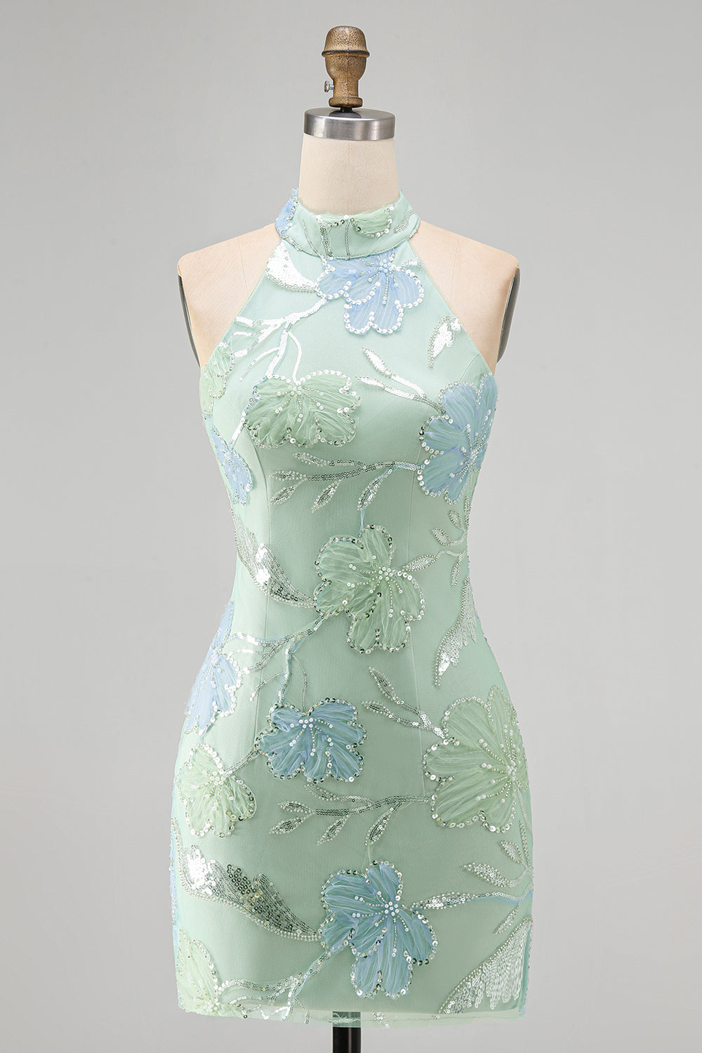 Robe de cocktail vert menthe moulante à licou et à sequins floraux