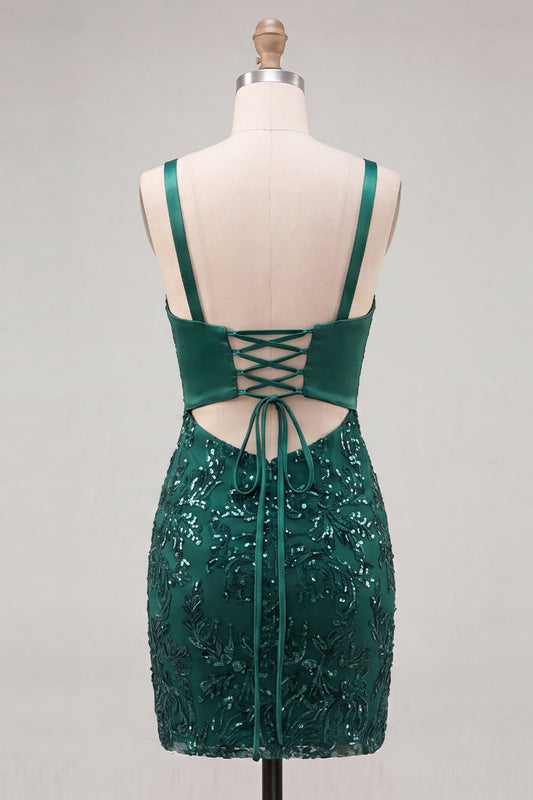 Robe de bal moulante vert foncé à bretelles spaghetti, paillettes et dos lacé avec nœud