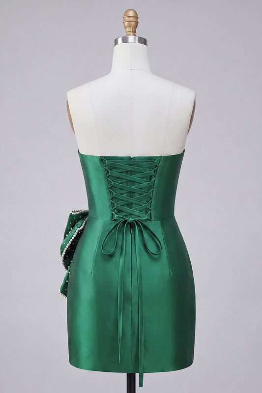Robe de bal bustier moulante vert foncé avec laçage au dos en perles, nœud à la taille
