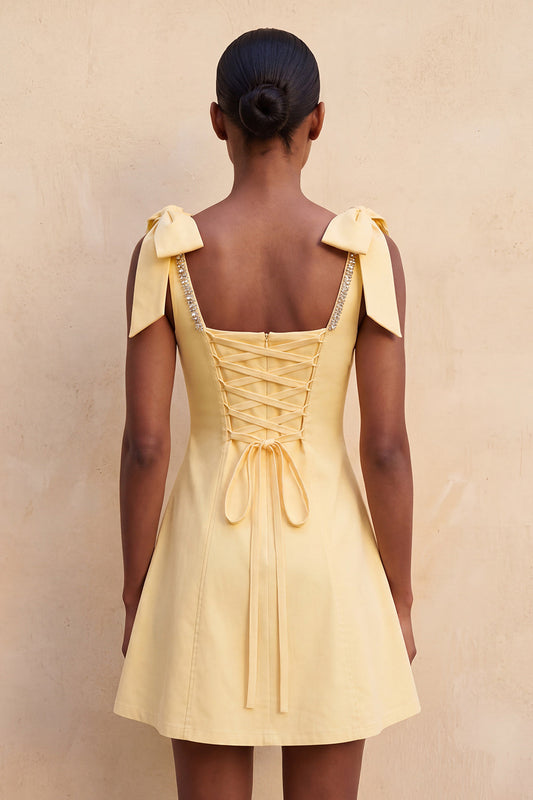 Light Yellow A-Line Bowed Straps Beaded Homecoming Dress with Lace Up Back