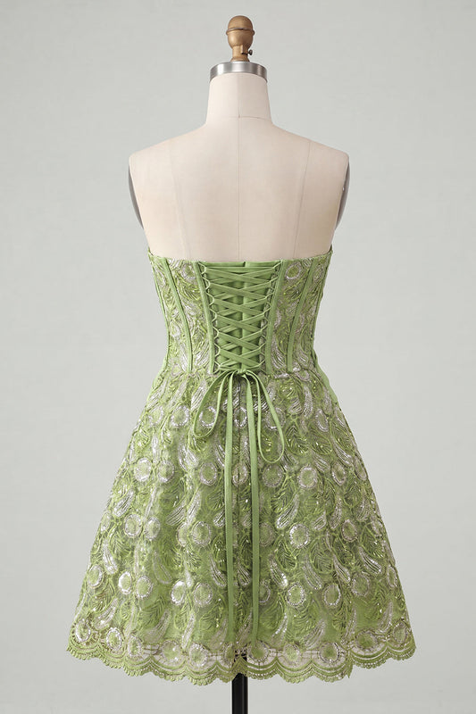 Robe de bal bustier verte trapèze avec corset, sequins et dos lacé