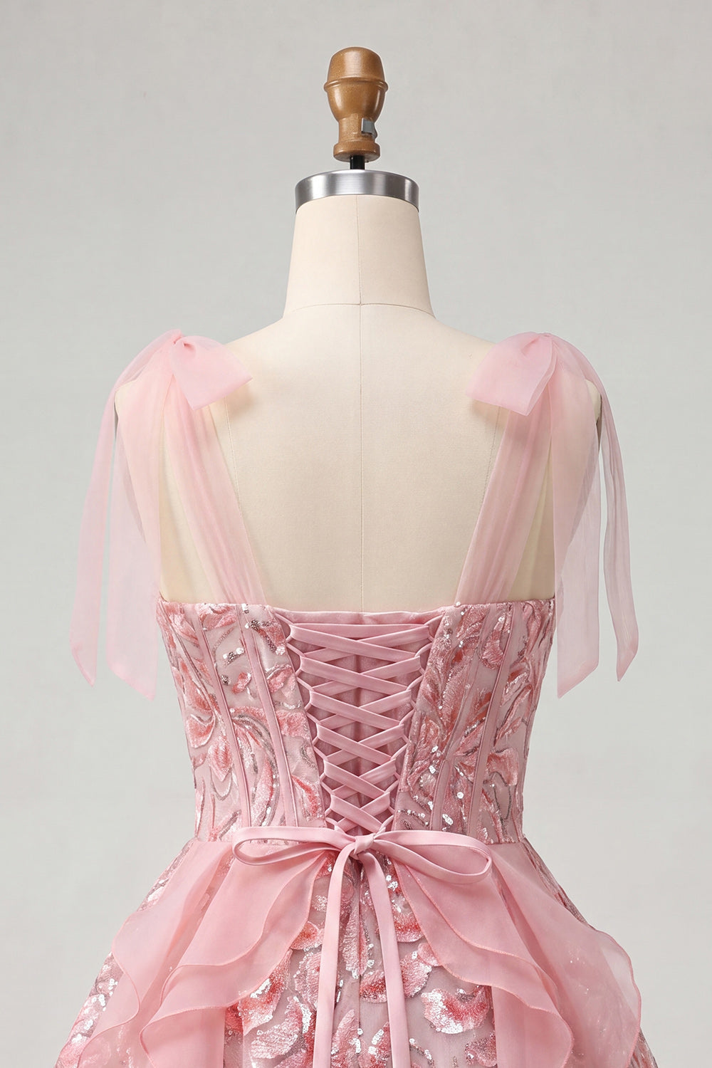 Pink A-Line Corset Bowed Straps Sequins Ruffled Homecoming Dress with Lace Up Back