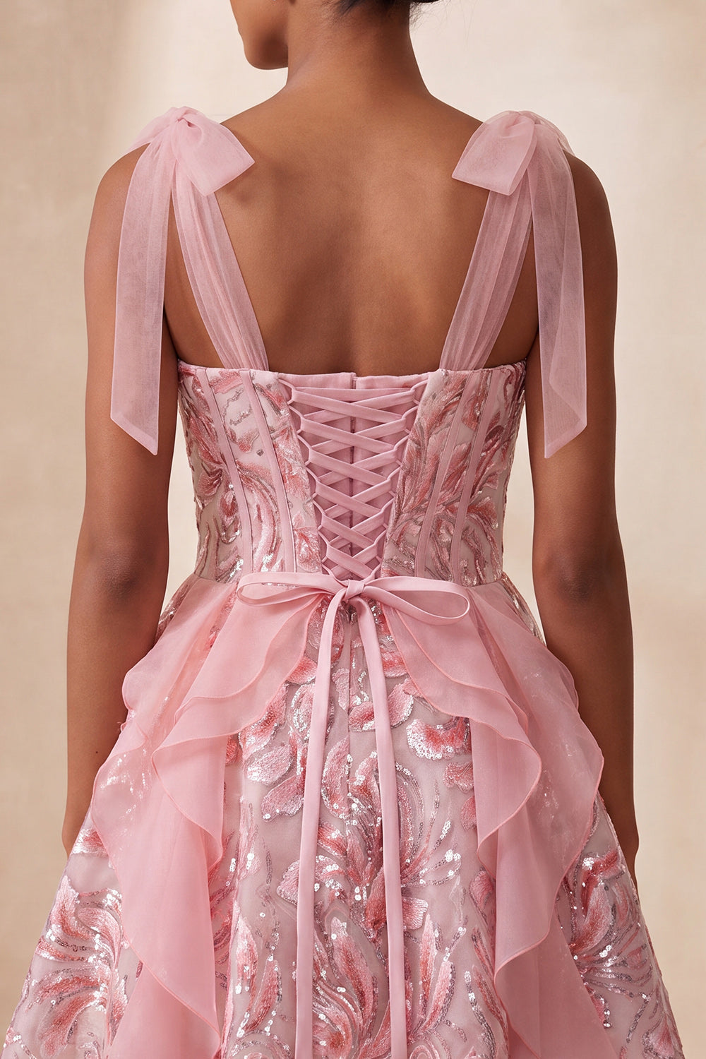 Pink A-Line Corset Bowed Straps Sequins Ruffled Homecoming Dress with Lace Up Back