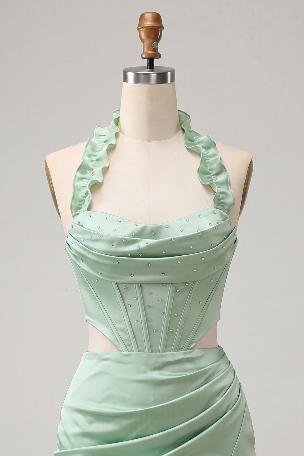 Robe courte de cocktail vert menthe froncée style corset sans bretelles avec fente