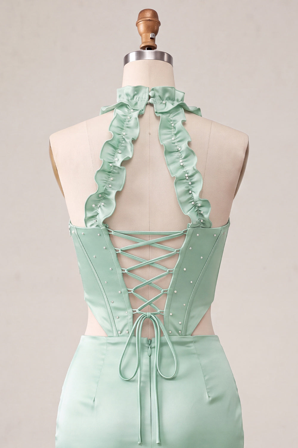Robe courte de cocktail vert menthe froncée style corset sans bretelles avec fente