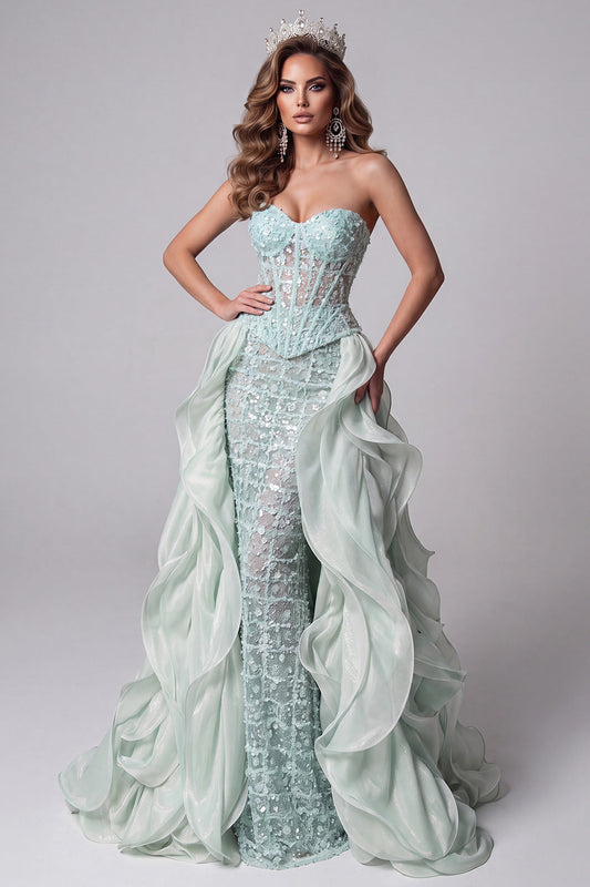 Robe longue de concours vert menthe sirène à bustier transparent avec paillettes et traîne à volants