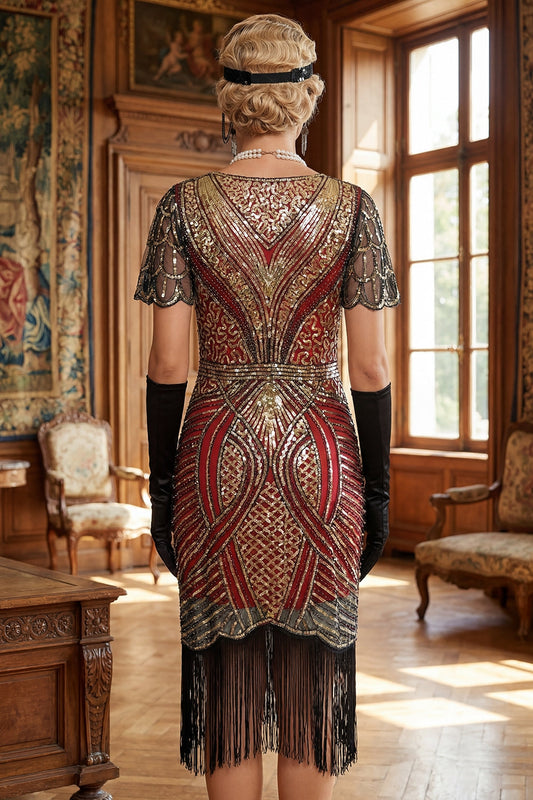Robe courte de soirée Rouge Doré à col en V à paillettes et coupe moulante style années 20, avec ourlet à franges