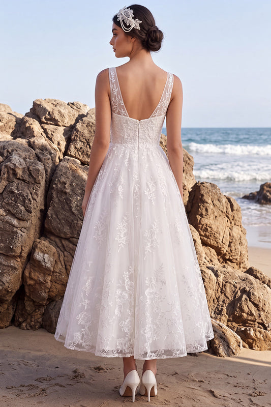 Robe de mariée longue blanche trapèze col en V brodée à fleurs