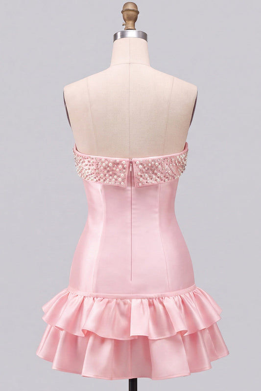 Robe de bal courte évasée rose sans bretelles avec perles, volants et volants