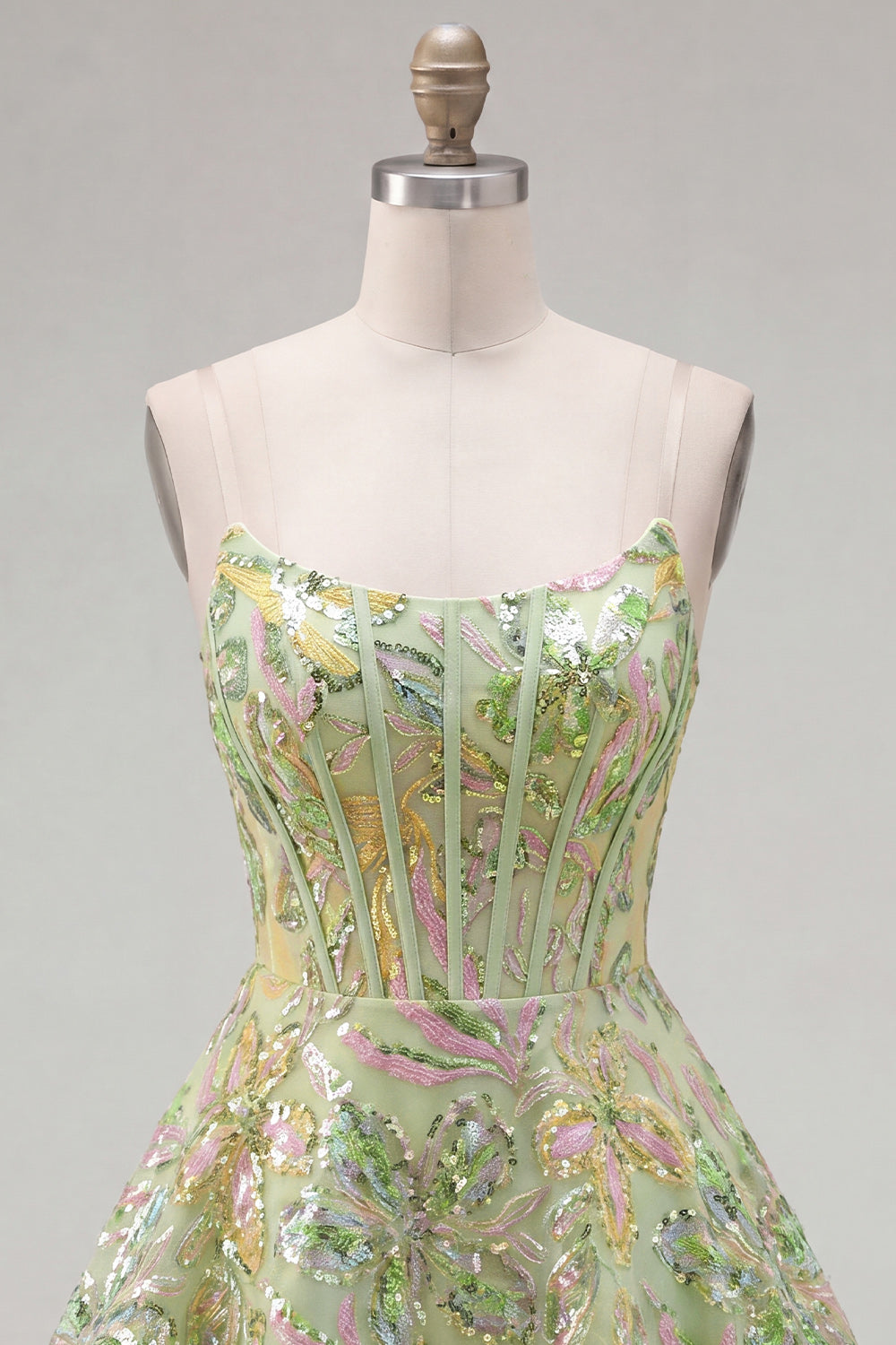 Robe courte de cocktail trapèze verte à corset et paillettes
