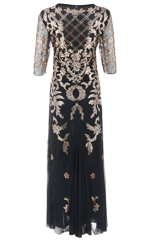 Robe noire à paillettes dorées années 20