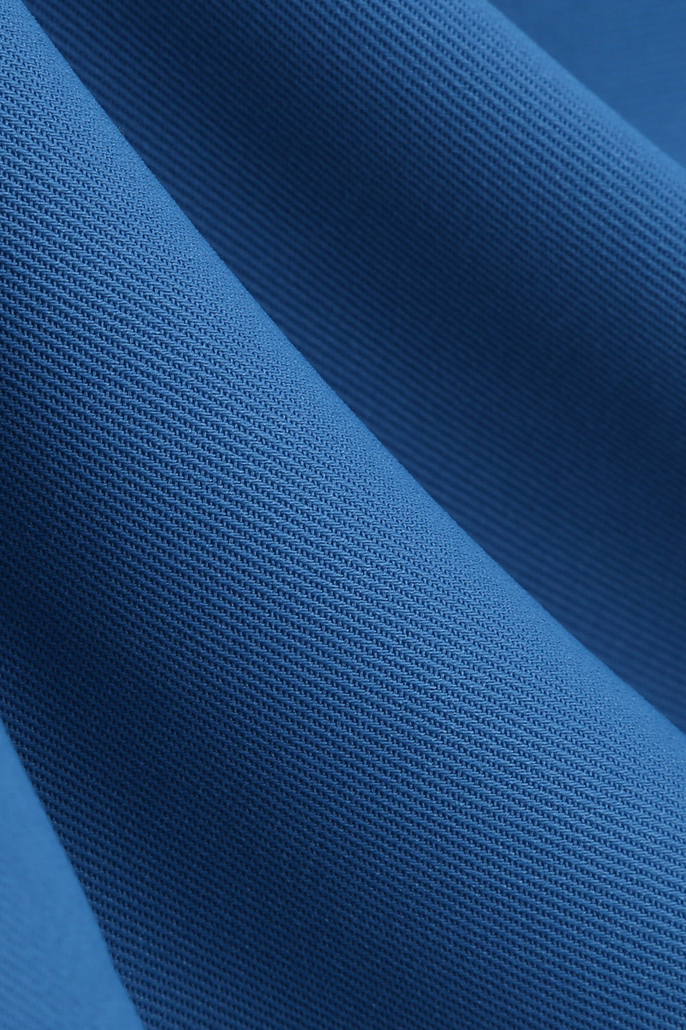 Robe style Hepburn des années 50 bleue à dos nu