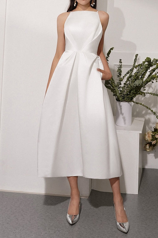 Robe midi blanche à fines bretelles