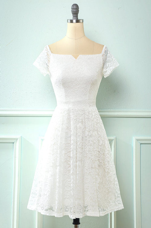 Robe de soirée blanche en dentelle à épaules dénudées