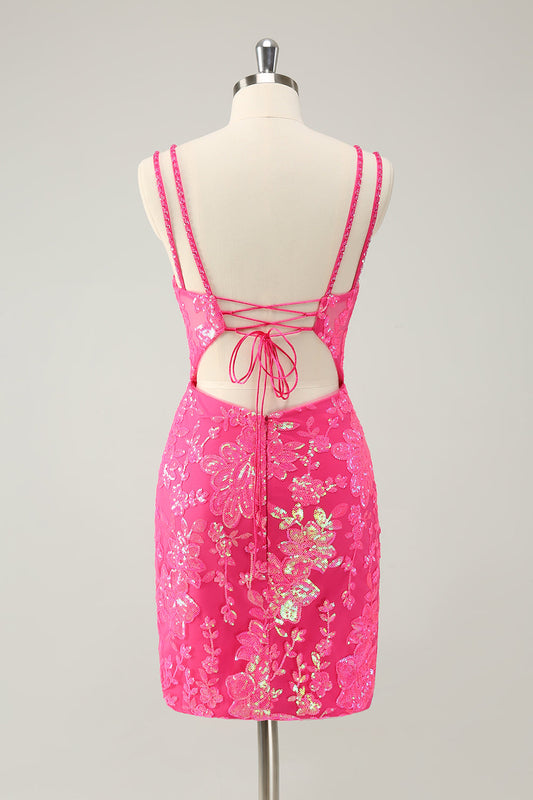 Magnifique robe de bal courte moulante rose vif pailletée à lacets avec fente