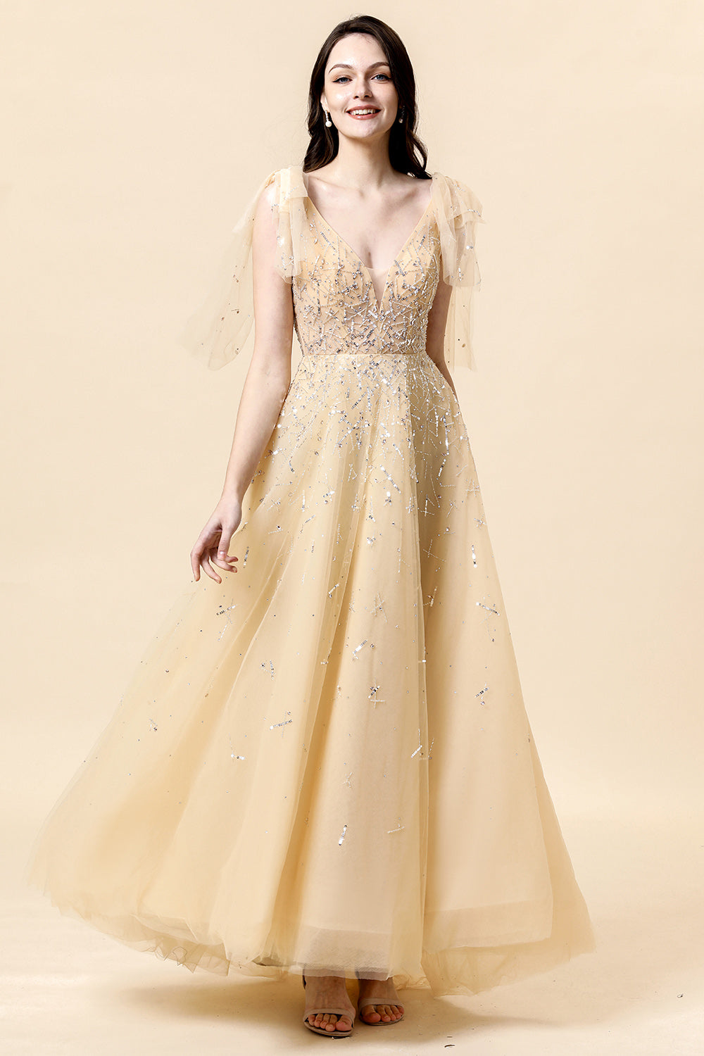 Robe de soirée trapèze ornée de perles jaunes scintillantes