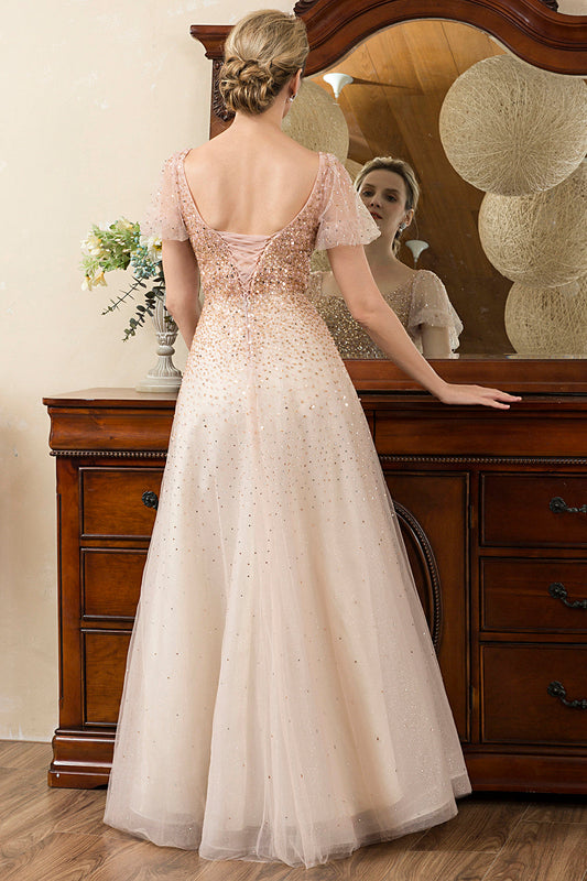 Robe de soirée scintillante ligne A perles fard à joues