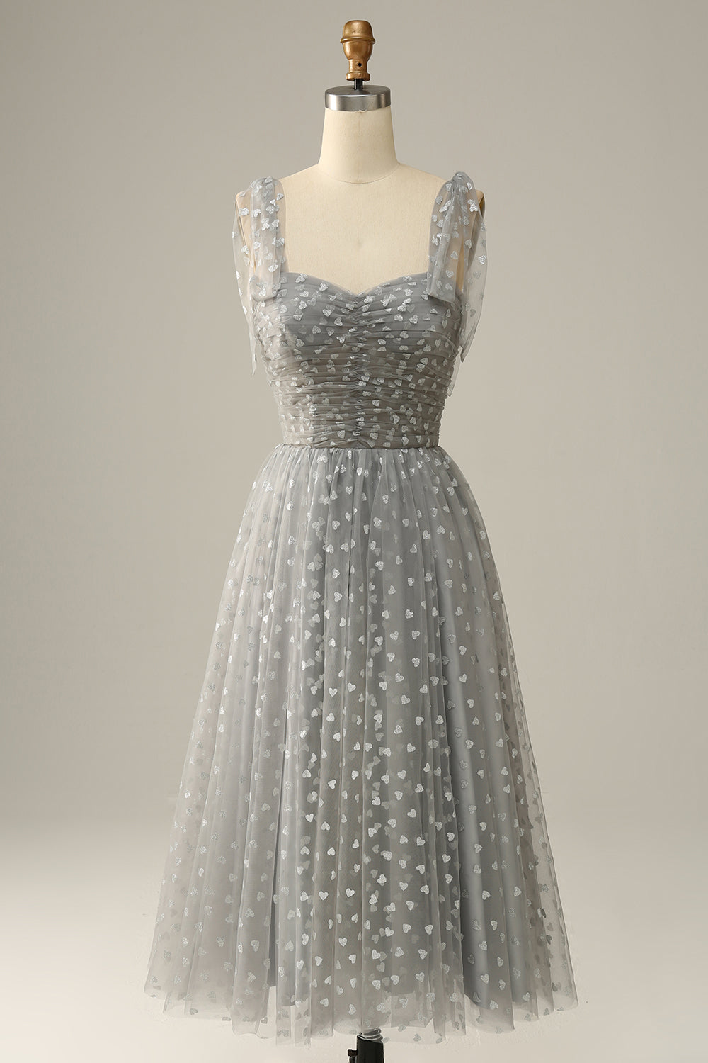 Robe de bal mi-longue grise à fines bretelles avec nœuds