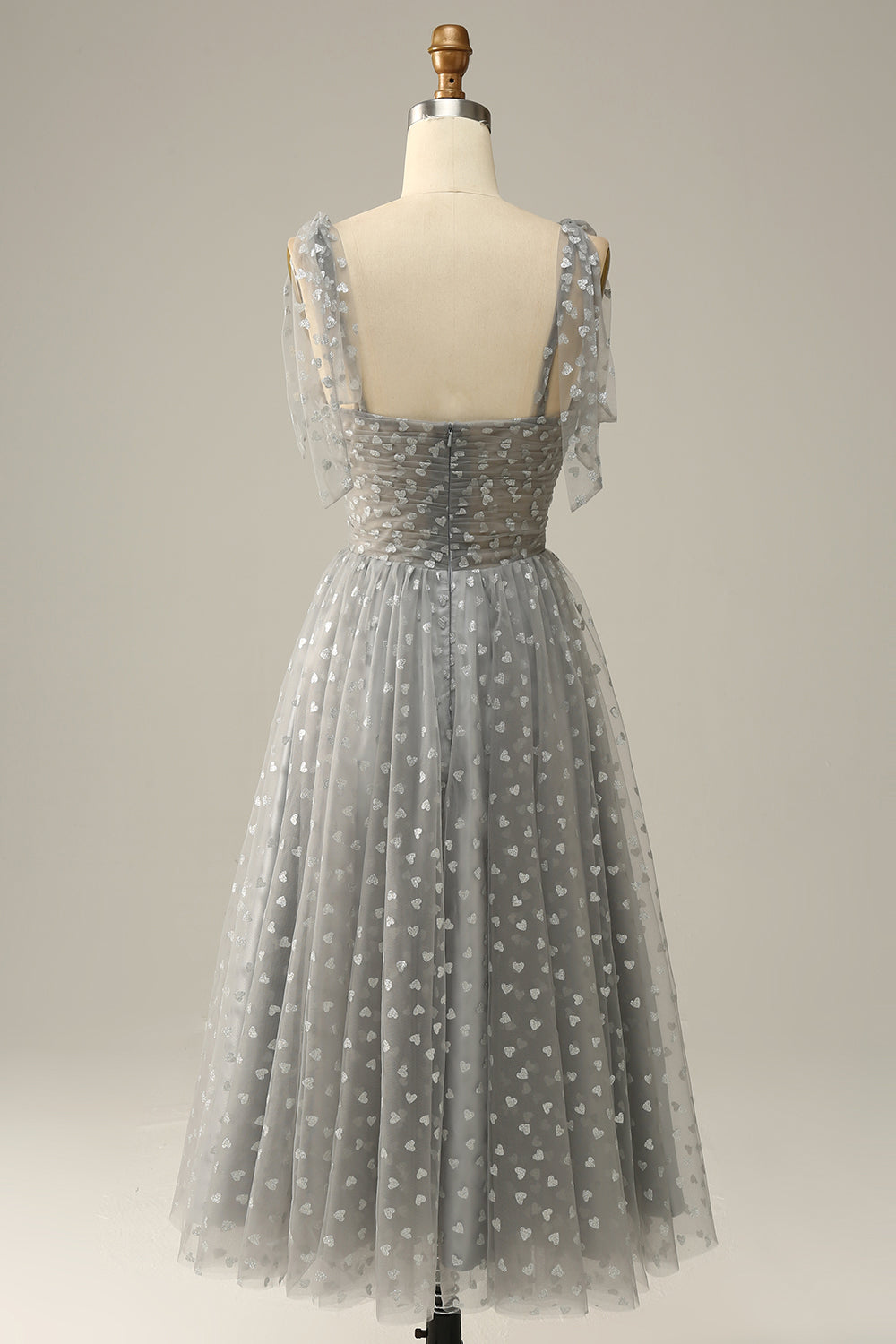 Robe de bal mi-longue grise à fines bretelles avec nœuds