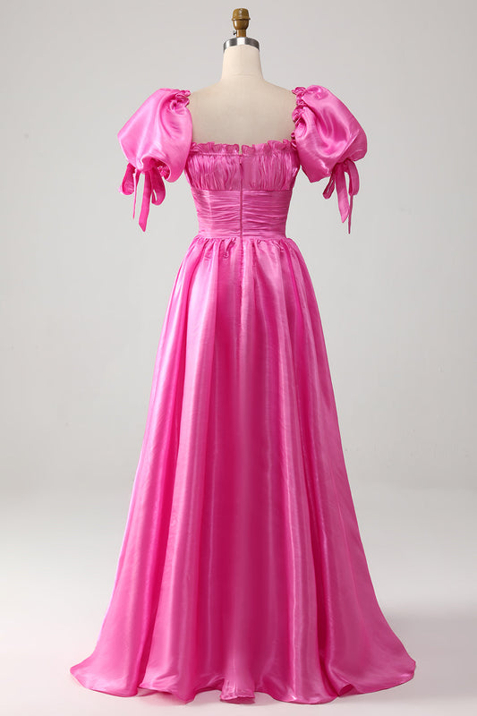 Vestido de fiesta rosa fuerte con volantes y mangas abullonadas