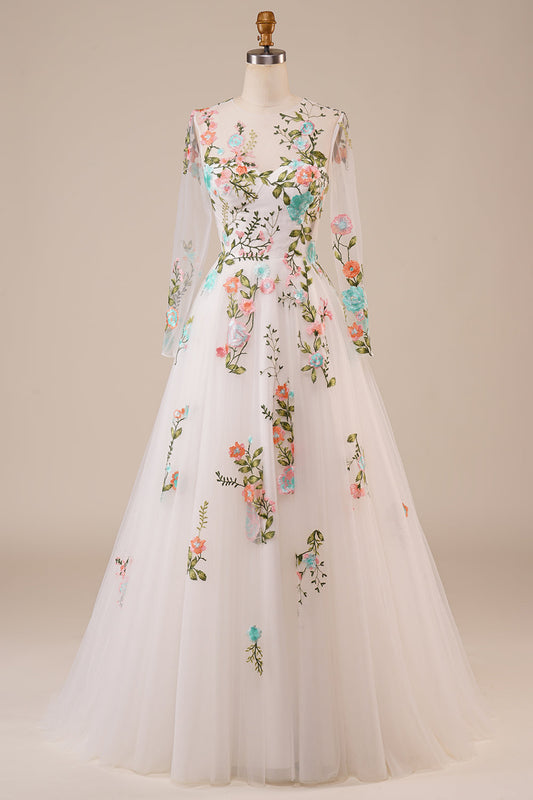 Robe de mariée longue ivoire en tulle à manches longues brodée