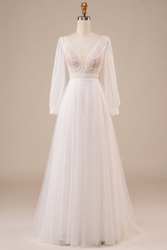 Robe de mariée ivoire évasée en tulle orné de perles avec manches
